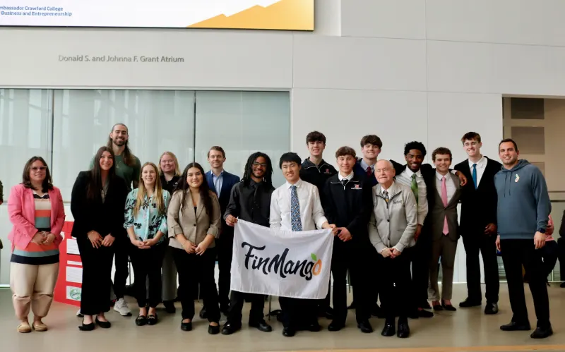 The 2026 Demo Day winners with the FinMango banner